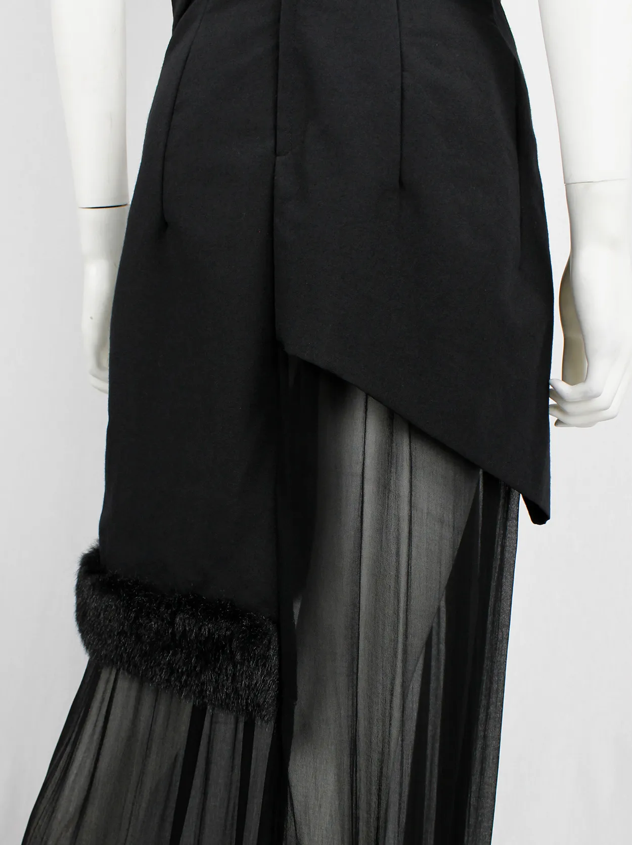 Comme des Garçons black panelled dress with faux fur trim on a sheer underlayer — fall 1997