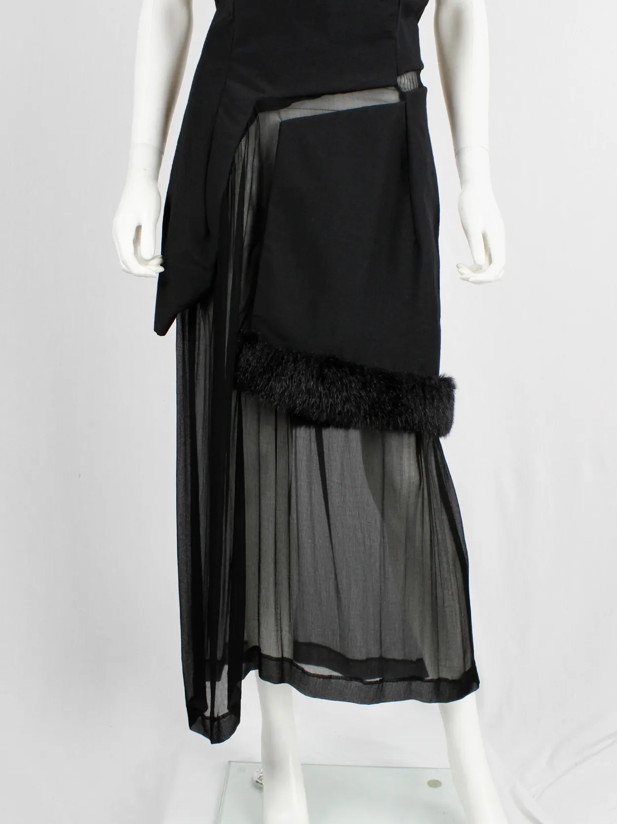 Comme des Garçons black panelled dress with faux fur trim on a sheer underlayer — fall 1997