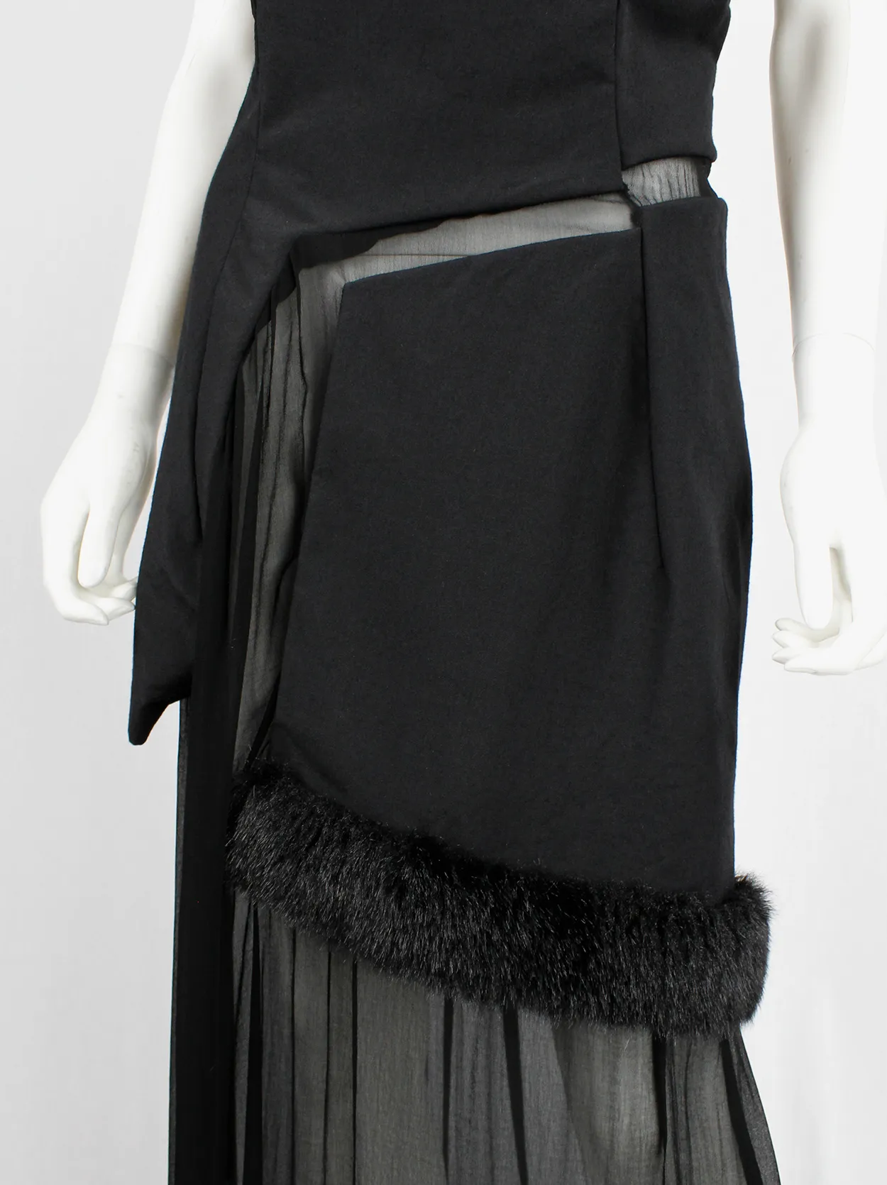 Comme des Garçons black panelled dress with faux fur trim on a sheer underlayer — fall 1997